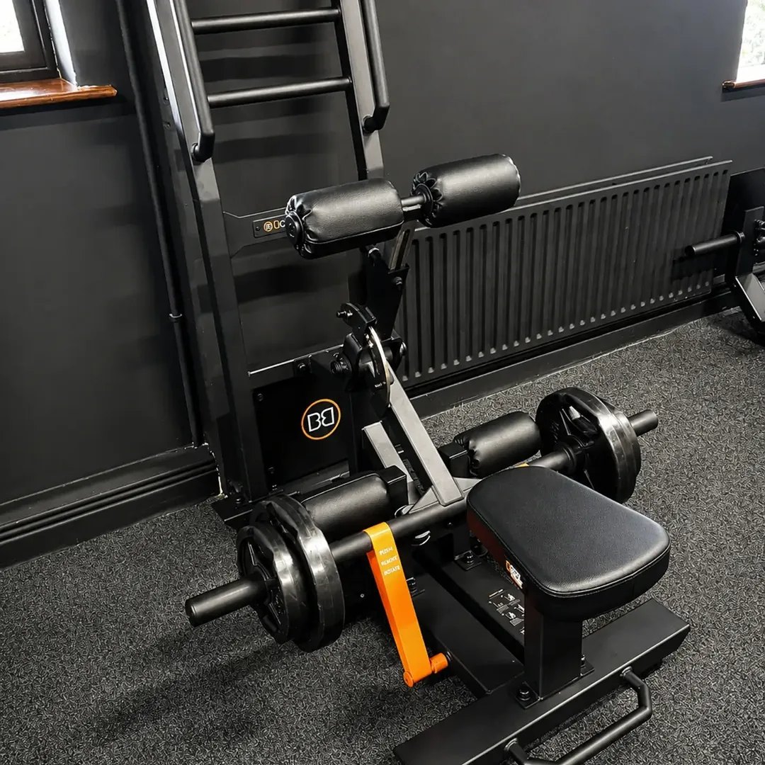 A standing hip thrust machine